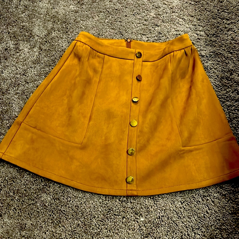 Mini skirt with gold buttons